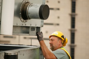 Hardhat man working on hvac installation
